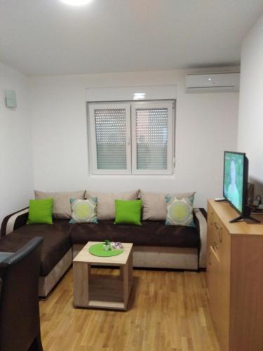 Et opholdsområde på Apartman Kaja