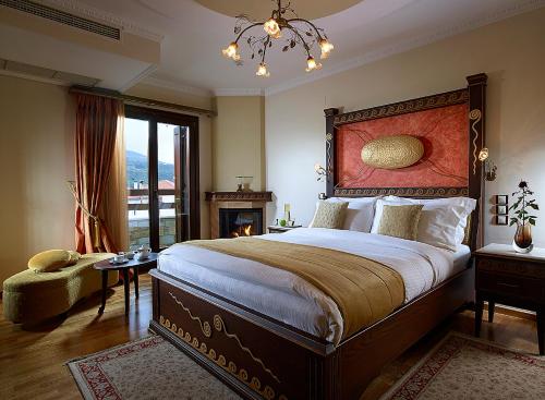 Ein Bett oder Betten in einem Zimmer der Unterkunft Stevalia Hotel & Spa