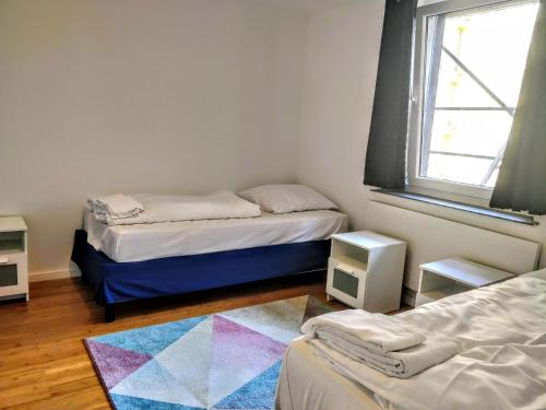 Ein Bett oder Betten in einem Zimmer der Unterkunft AVI City Apartments MainHouse