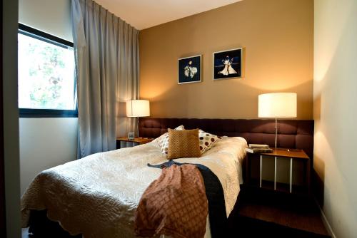 Cama o camas de una habitación en King George Apartments