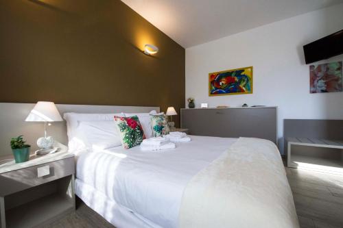 Ένα ή περισσότερα κρεβάτια σε δωμάτιο στο B&B Pousada Rio Aosta-servizi di Bed and breakfast