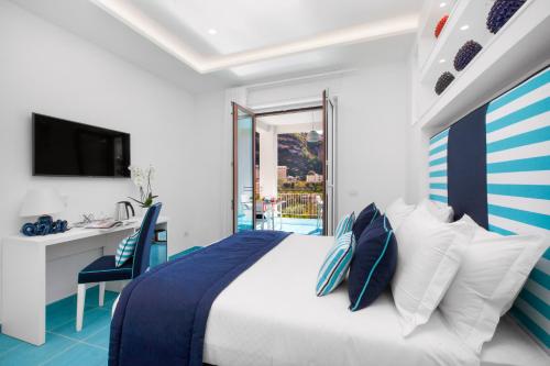Cama o camas de una habitación en YourHome - Sersale Suites