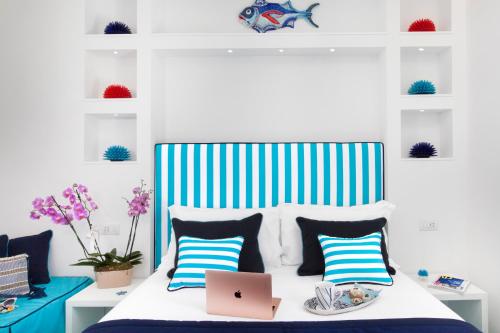 Cama o camas de una habitación en YourHome - Sersale Suites
