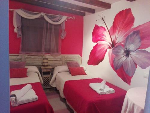 Postel nebo postele na pokoji v ubytování Casa rural El Rincón