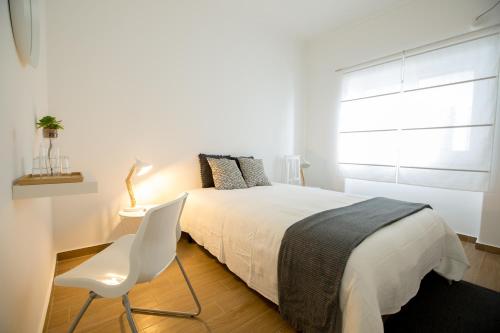 Cama o camas de una habitación en The Minimal House II