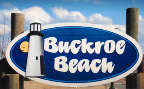 a sign for a beach with a lighthouse on it at LUXURY HOME 5 BR 3 BA Near Beaches and Venues in Hampton