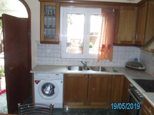 Kuchyň nebo kuchyňský kout v ubytování George's House