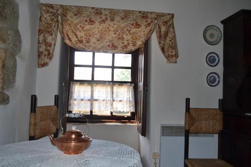 Ένα ή περισσότερα κρεβάτια σε δωμάτιο στο Quinta Santa Isabel