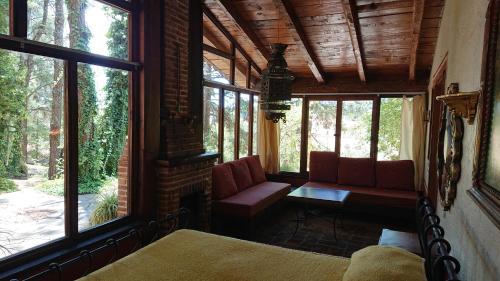 Posezení v ubytování Cabañas Tapalpa Sierra del Tecuan, Cabaña Patos