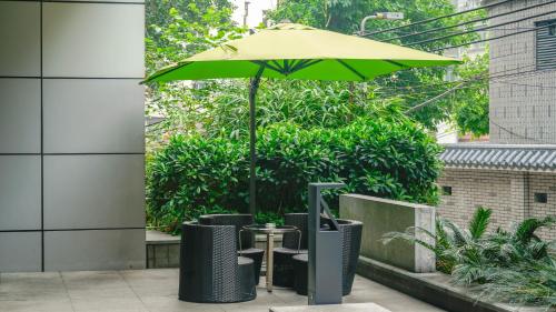 Κήπος έξω από το Paco Hotel Ouzhuang Metro Guangzhou-Free shuttle to Canton fair