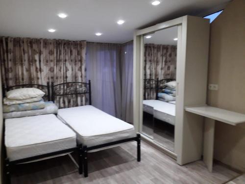 מיטה או מיטות בחדר ב-GTNL Aparthotel