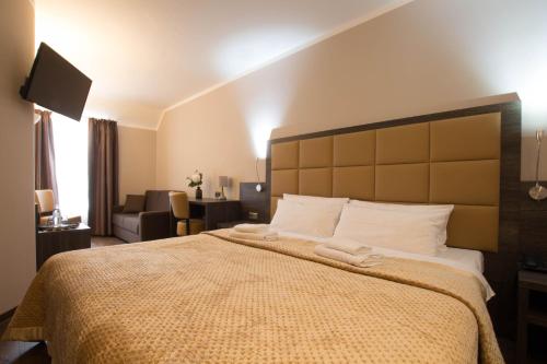 Postel nebo postele na pokoji v ubytování Hotel Delta am Potsdamer Platz