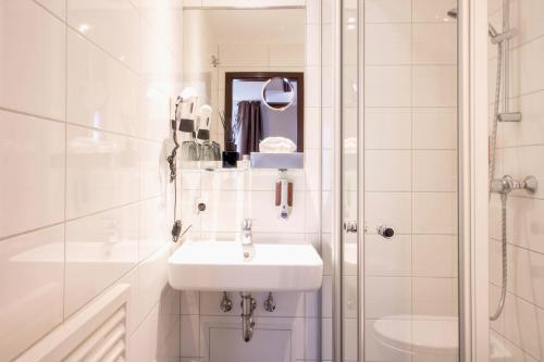 Koupelna v ubytování Hotel Delta am Potsdamer Platz