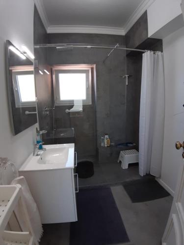 Ванна кімната в Sunrise Terrace Apartment