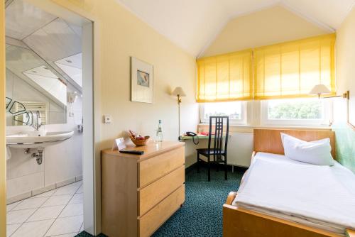 Letto o letti in una camera di Andante Hotel Dresden