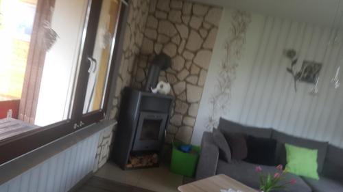 Posezení v ubytování Ferienhaus am Teich