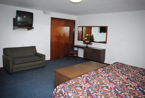 เตียงในห้องที่ Mallorca Hotel 