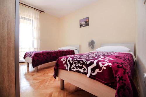 Postel nebo postele na pokoji v ubytování villa red hill