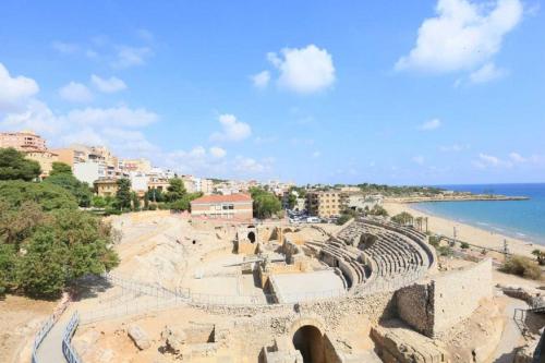 a view of an amphitheater on the beach at Tarragona Ciudad, El Serrallo AP-3 in Tarragona