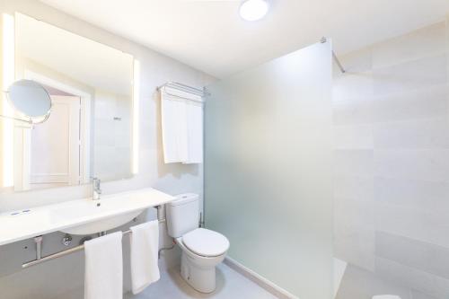 Ένα μπάνιο στο Apartamentos Casa Vida