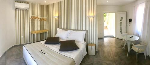 Postel nebo postele na pokoji v ubytování Apartments VIP Residence