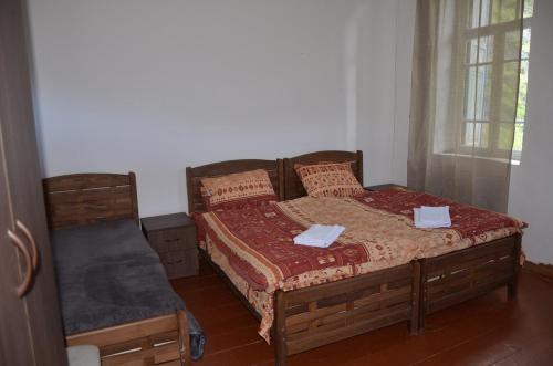 Säng eller sängar i ett rum på Vichnashi