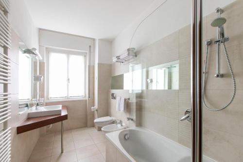 Ein Badezimmer in der Unterkunft Hotel Conradi