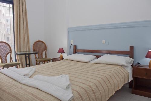 Danaos Hotelにあるベッド