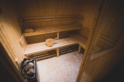 an overhead view of a wooden sauna with a wooden bowl at Le Relais Du Lac in Hossegor
