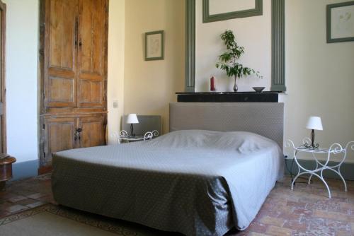 Кровать или кровати в номере Chambres d'hotes du Jay