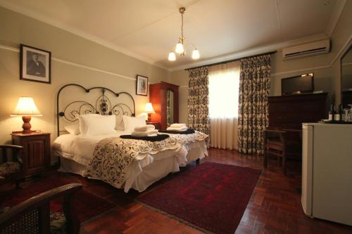 A bed or beds in a room at Morgenzon Estate
