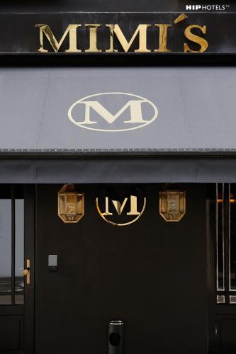 a mris sign on the front of a store at Mimi's Hotel Soho in London