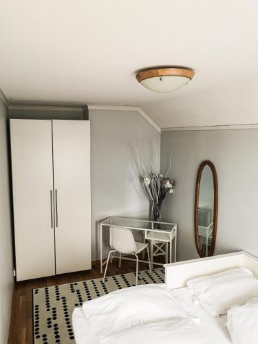 Ένα ή περισσότερα κρεβάτια σε δωμάτιο στο Silent Seaview Luxury Apartment Grasholmen
