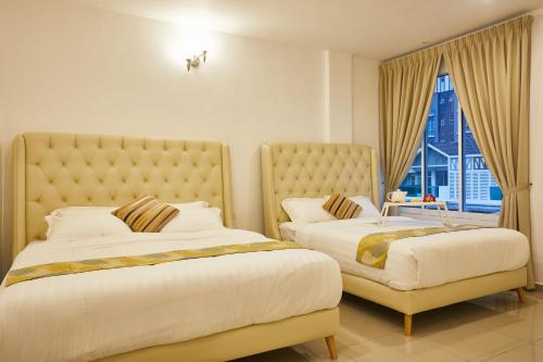 En eller flere senge i et værelse på Ahn-Yi Residence