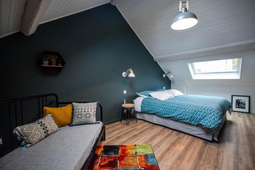 A bed or beds in a room at Une Odeur de Tilleul
