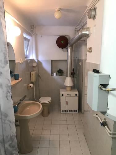 Ванная комната в Friends Villa Apartments 2