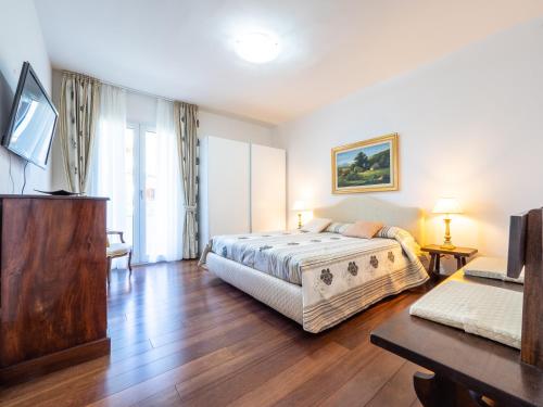Postel nebo postele na pokoji v ubytování B&B Le Bouganville