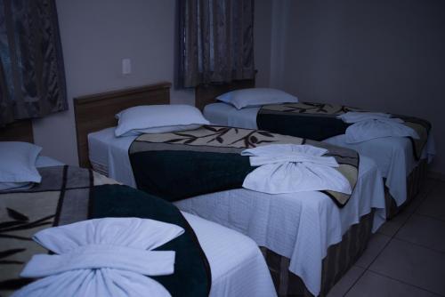 Postel nebo postele na pokoji v ubytování Sokulski Flat Hotel e Restaurante