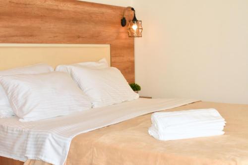 Postel nebo postele na pokoji v ubytování Beach Walk Apartments