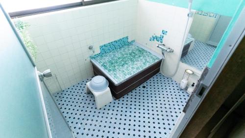 Ванная комната в 一棟貸し宿Kusuburu House chartered accommodation