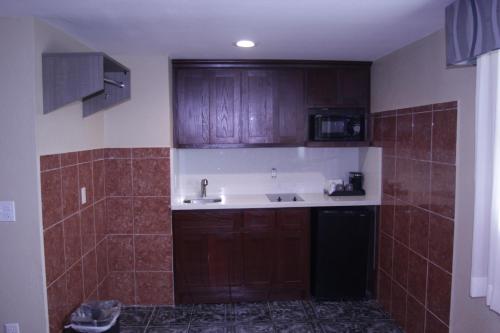 Η κουζίνα ή μικρή κουζίνα στο Americas Best Value Inn Port Aransas