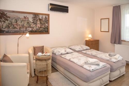 Posteľ alebo postele v izbe v ubytovaní Deluxe Apartments