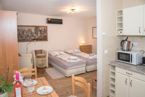 Kuchyňa alebo kuchynka v ubytovaní Deluxe Apartments