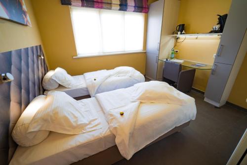 Su'ro Bed and Breakfastにあるベッド