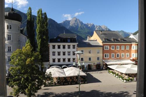 a view of a town with mountains in the background at City Zimmer - Appartement Dina Mariner in Lienz