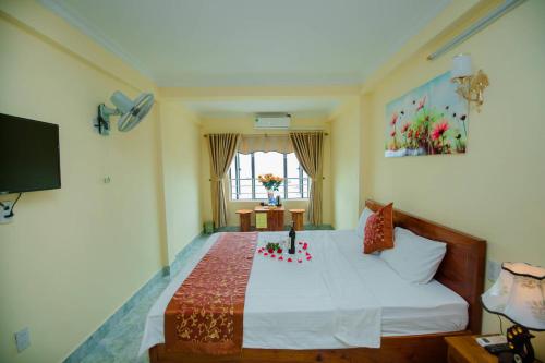 Cat Ba Bay Vision Hotelにあるベッド