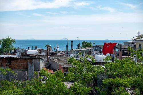 a view of a city with the ocean in the background at Golden Sand Hotel in Istanbul