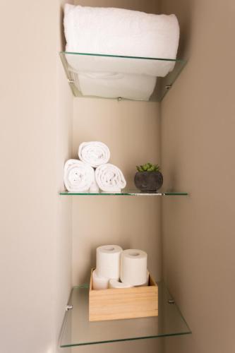 a closet with towels and a shelf with towels at Sky Touristic Attic in Valencia