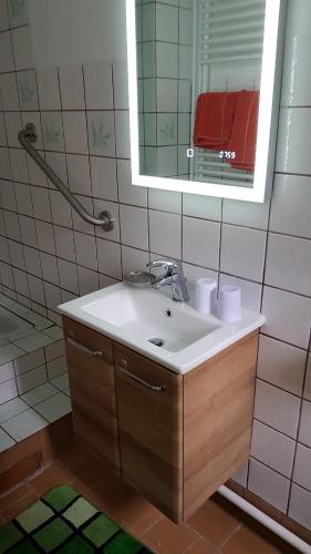 Ένα μπάνιο στο Ferienwohnung Baacke