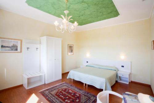 A bed or beds in a room at Villa Dei Dogi